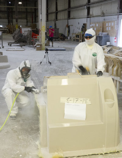 cutting flashing off a de-molded part